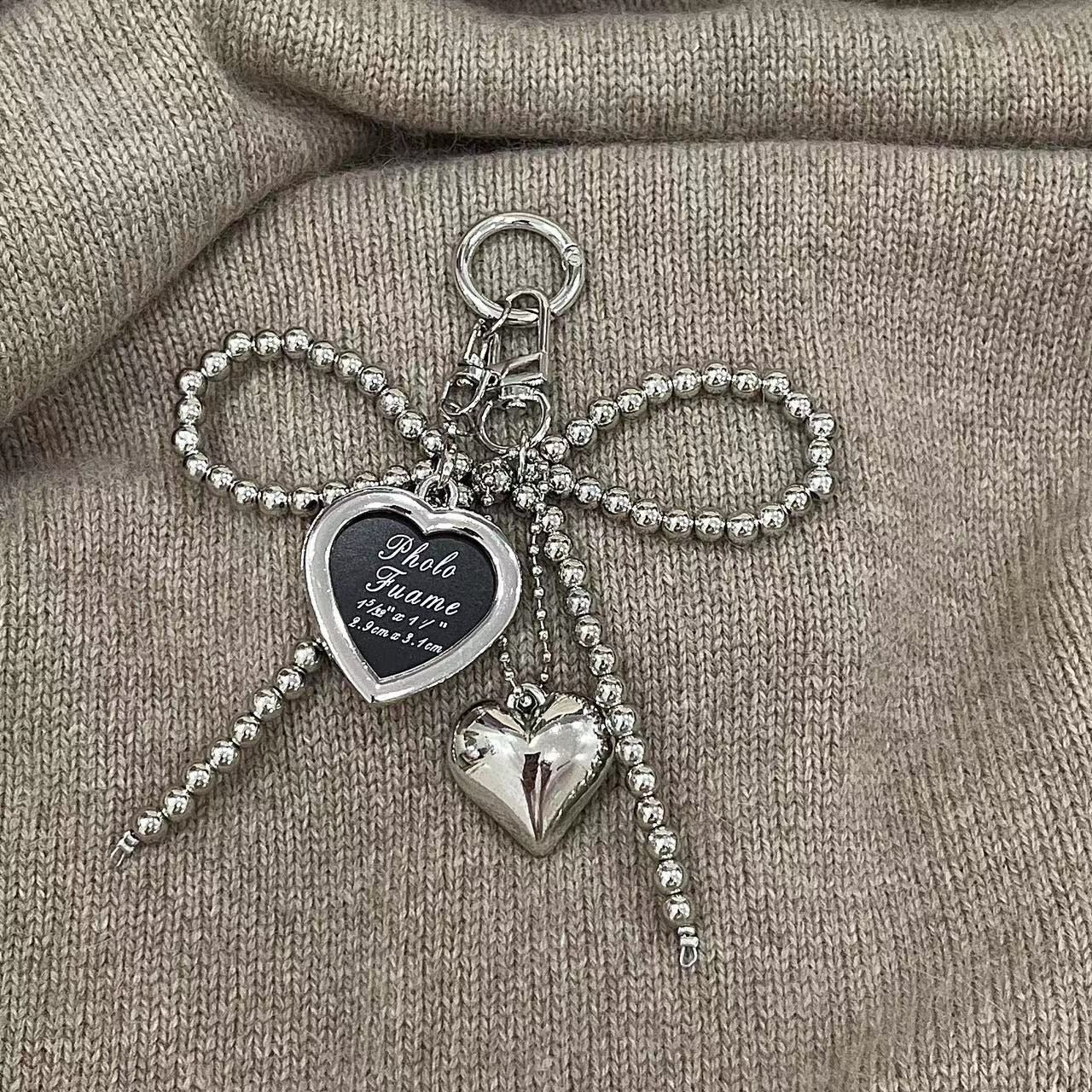 Silver heart charm