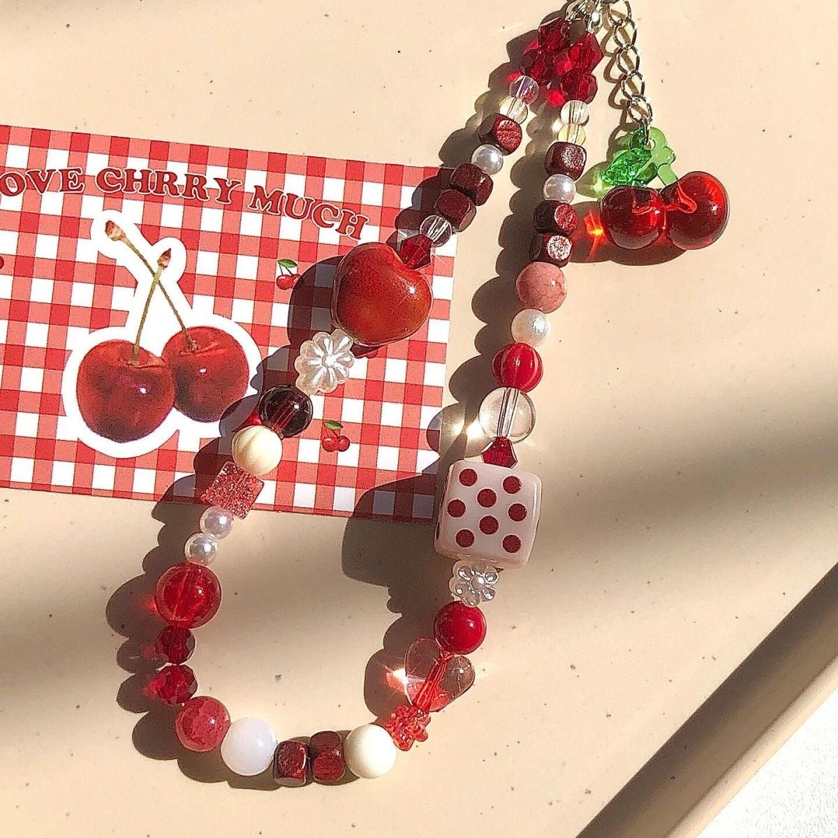 Red cherry long charm