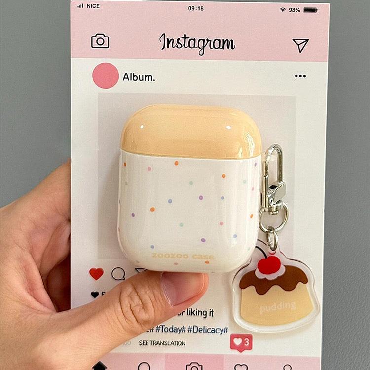 Two-tone plaid AirPods case with keychain in yellow, blue, green, and pink. Compatible with AirPods Pro 2, AirPods 3, and AirPods 4.