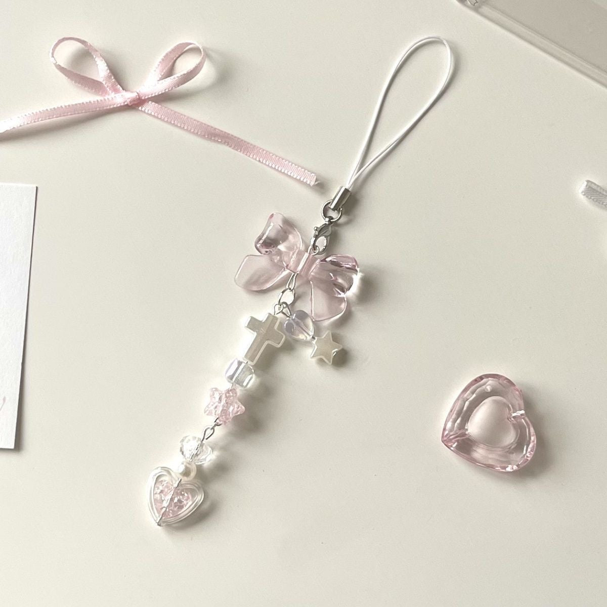 Pink story charm