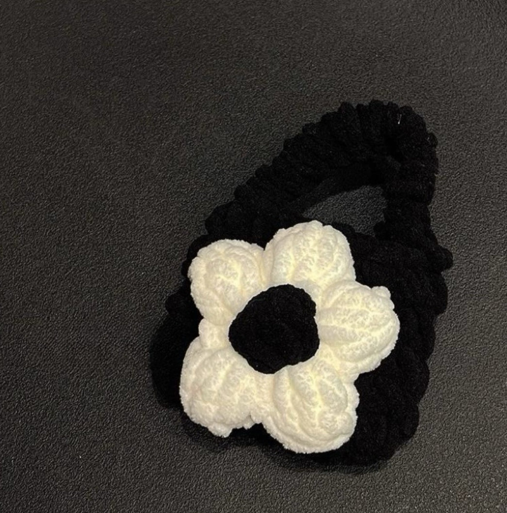 Handcrafted knitted flower charm