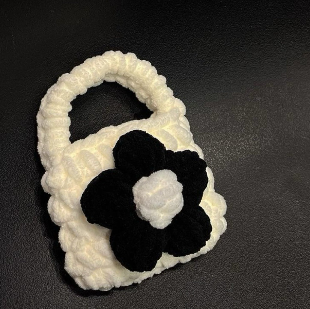 Handcrafted knitted flower charm