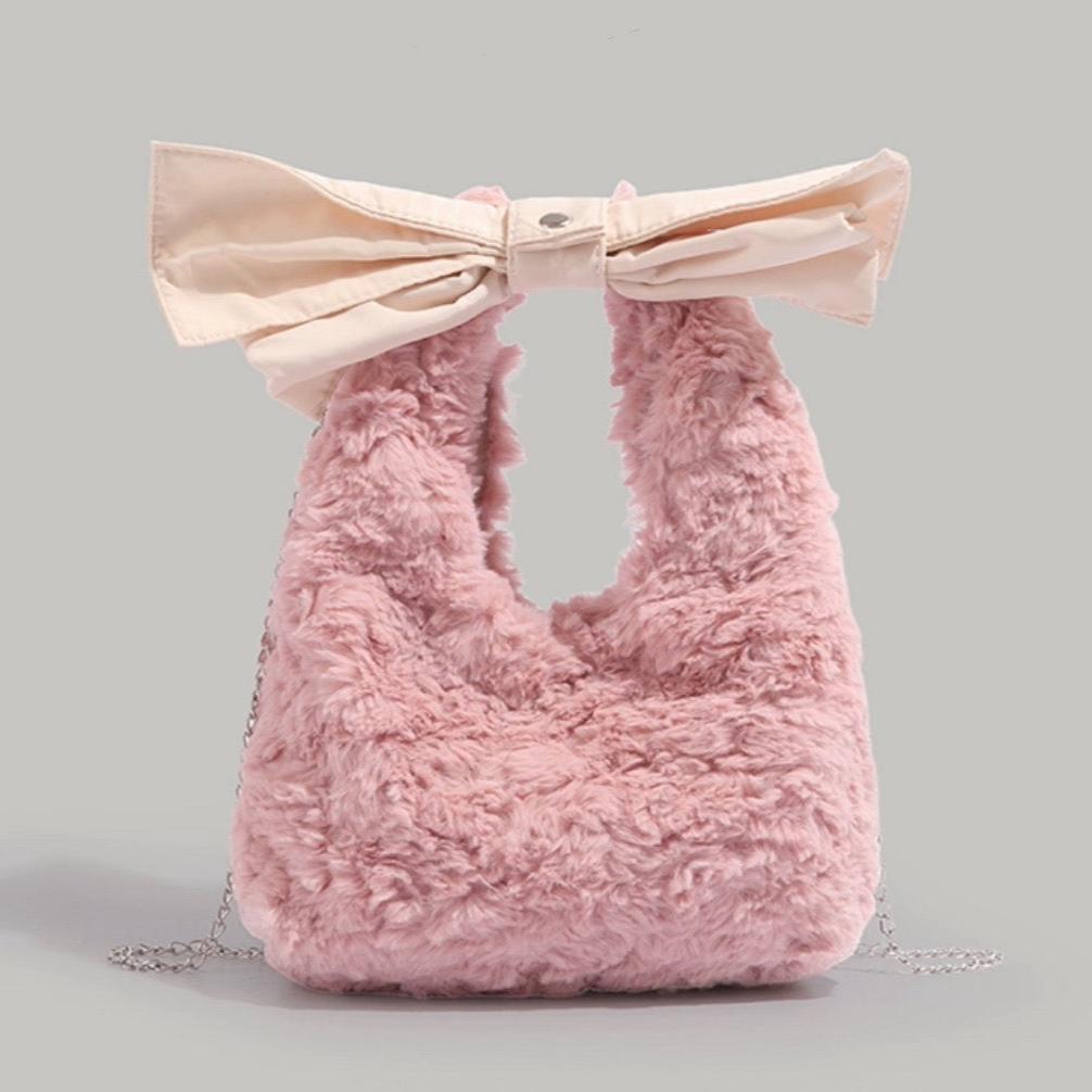 Pink furry bag with big ribbon