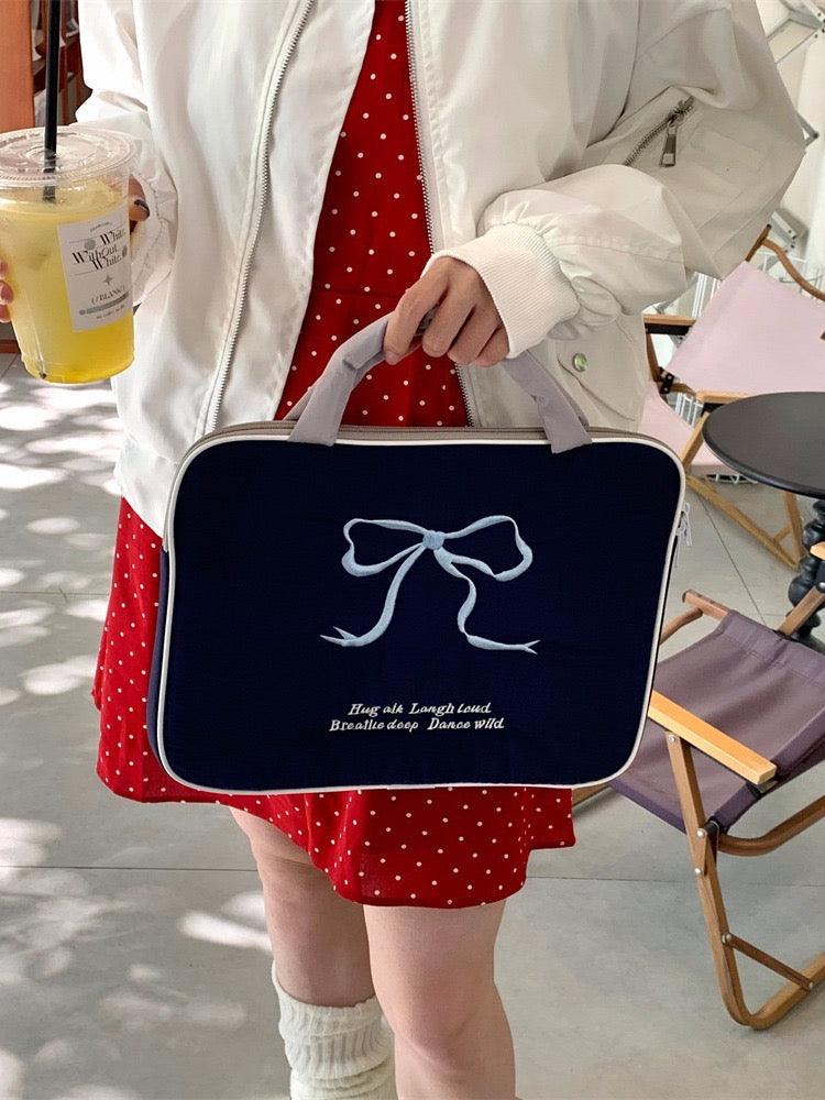 Two tone ribbon hand carry tablet bag