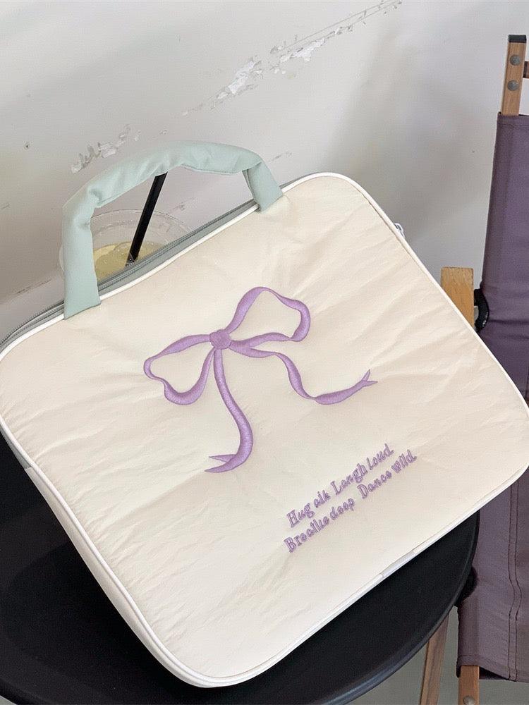 Two tone ribbon hand carry tablet bag