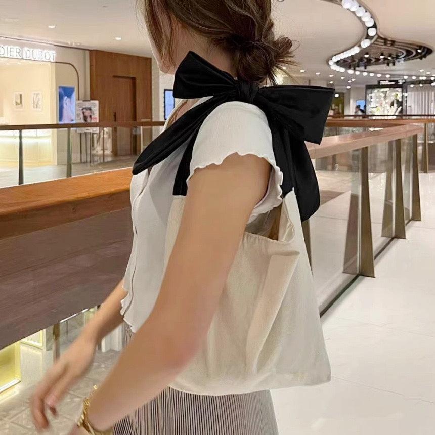 Satin ribbon shoulder bag