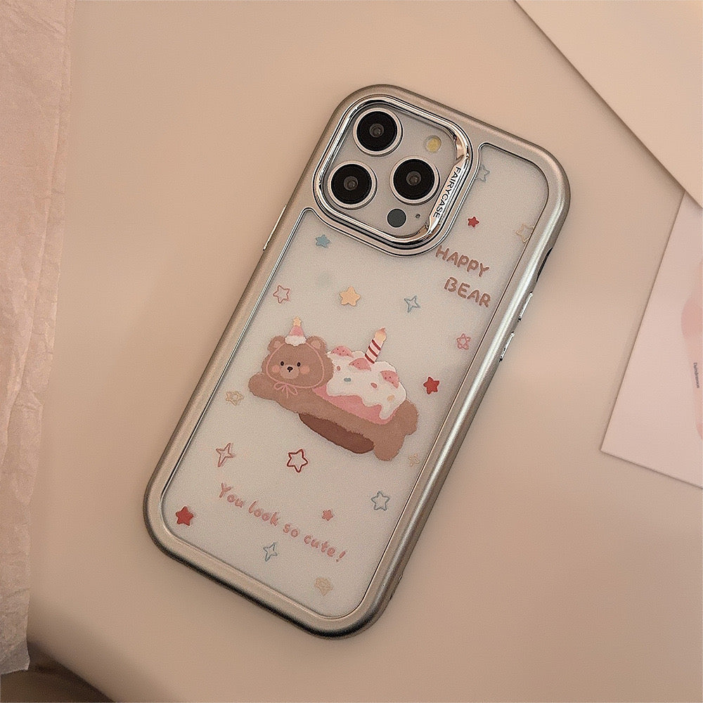 Happy Bear iPhone case with pastel design, featuring a cute bear on a dessert and a matching grip stand for convenience.